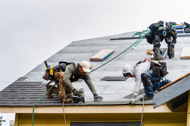 Professional Gutter Installation technician working in Columbia, MD